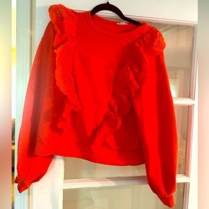 Orange ruffle sweatshirt